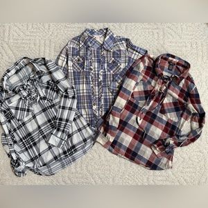 Plaid shirts from Rue 21 and Arizona.